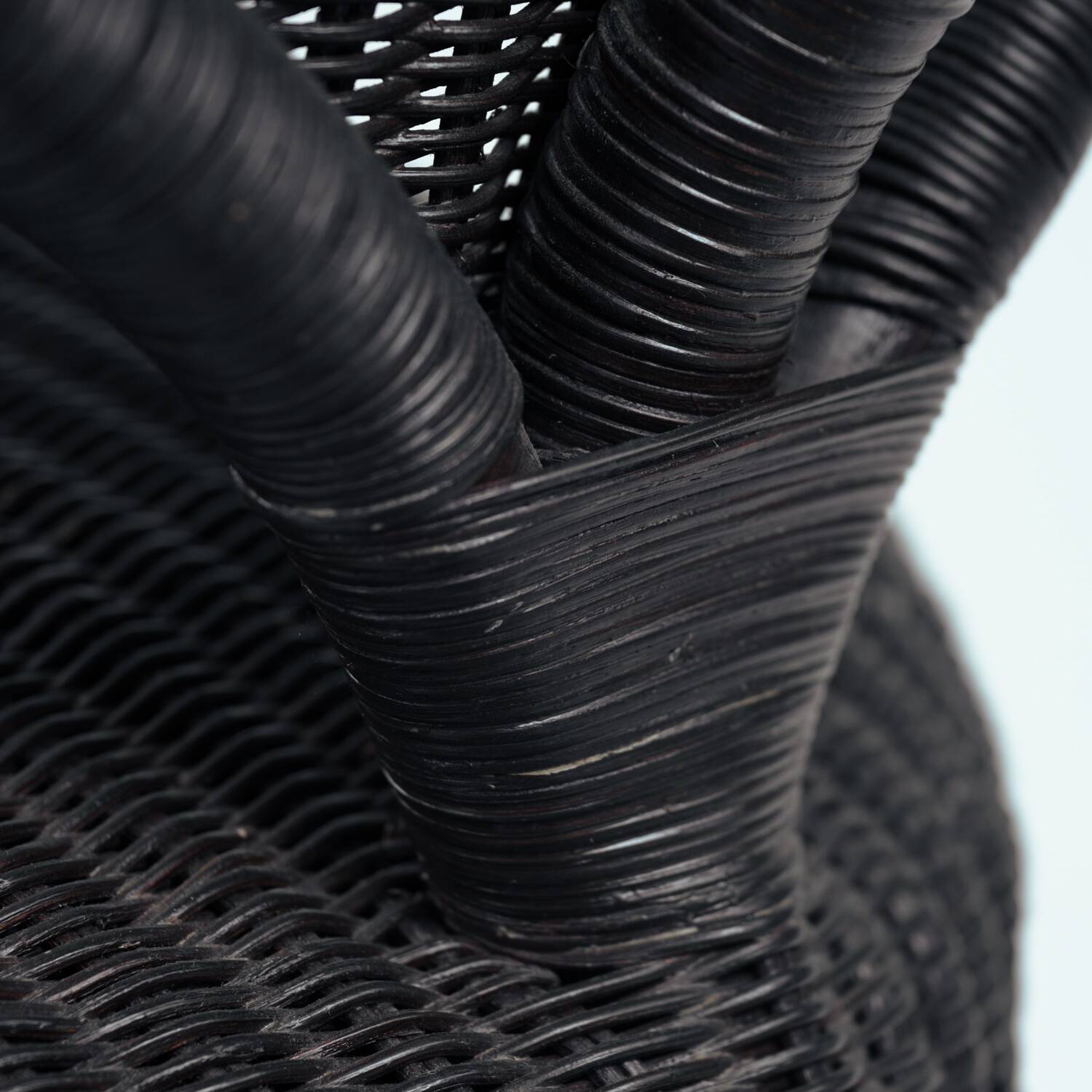 Sculptural rattan tripod armchairs in the manner of Boris Sipek