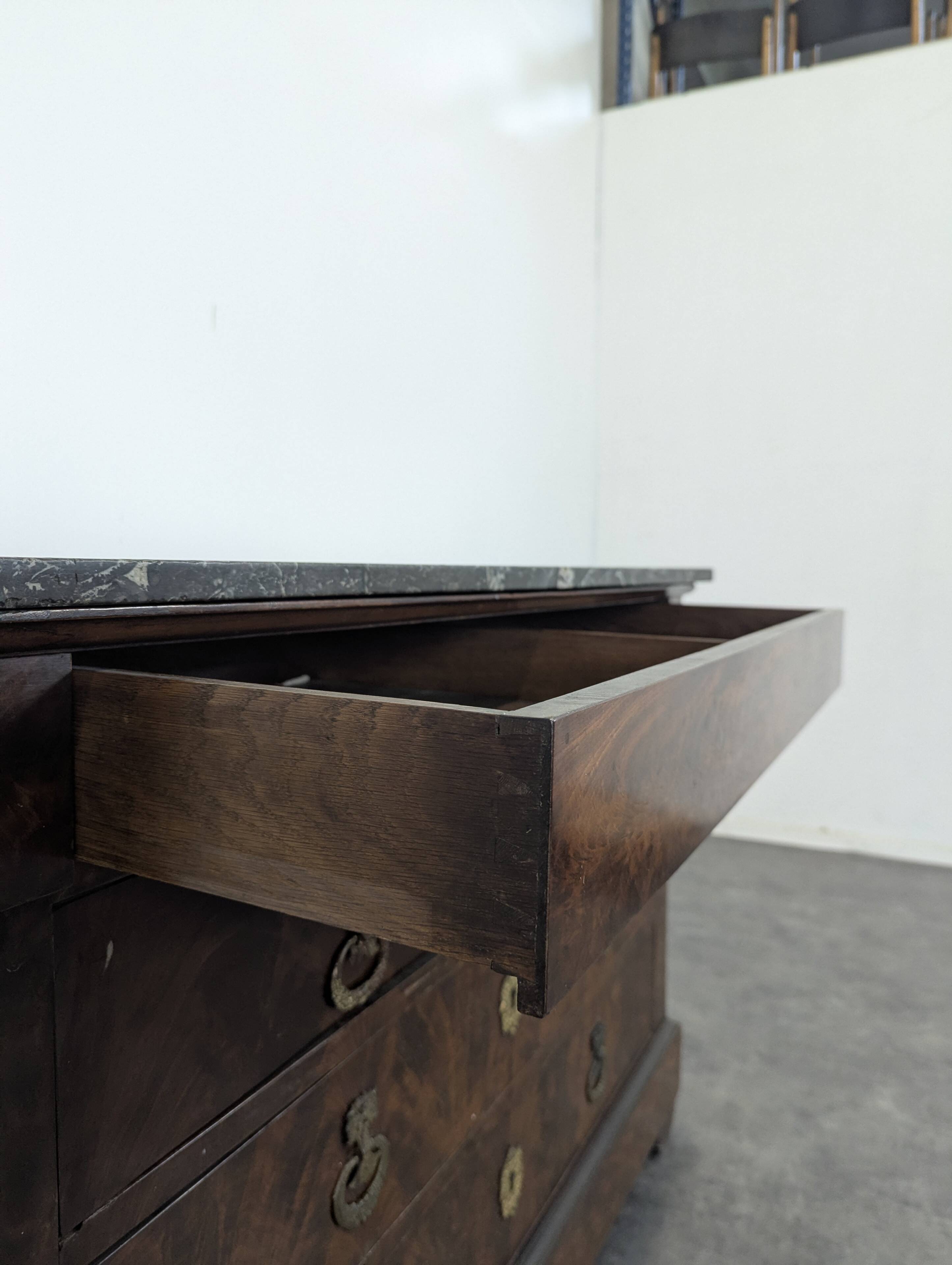 Restoration period chest of drawers with bronze ornaments