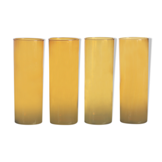 4 amber glasses with orangeade
