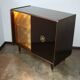 A vintage cabinet with a record player and a bar, 1960s.
