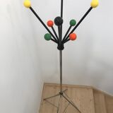 Wearing chrome parrot coat, black and multicolored balls