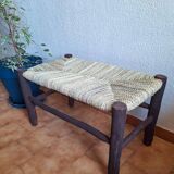 Moroccan bench in dark wood with woven palm leaf seat