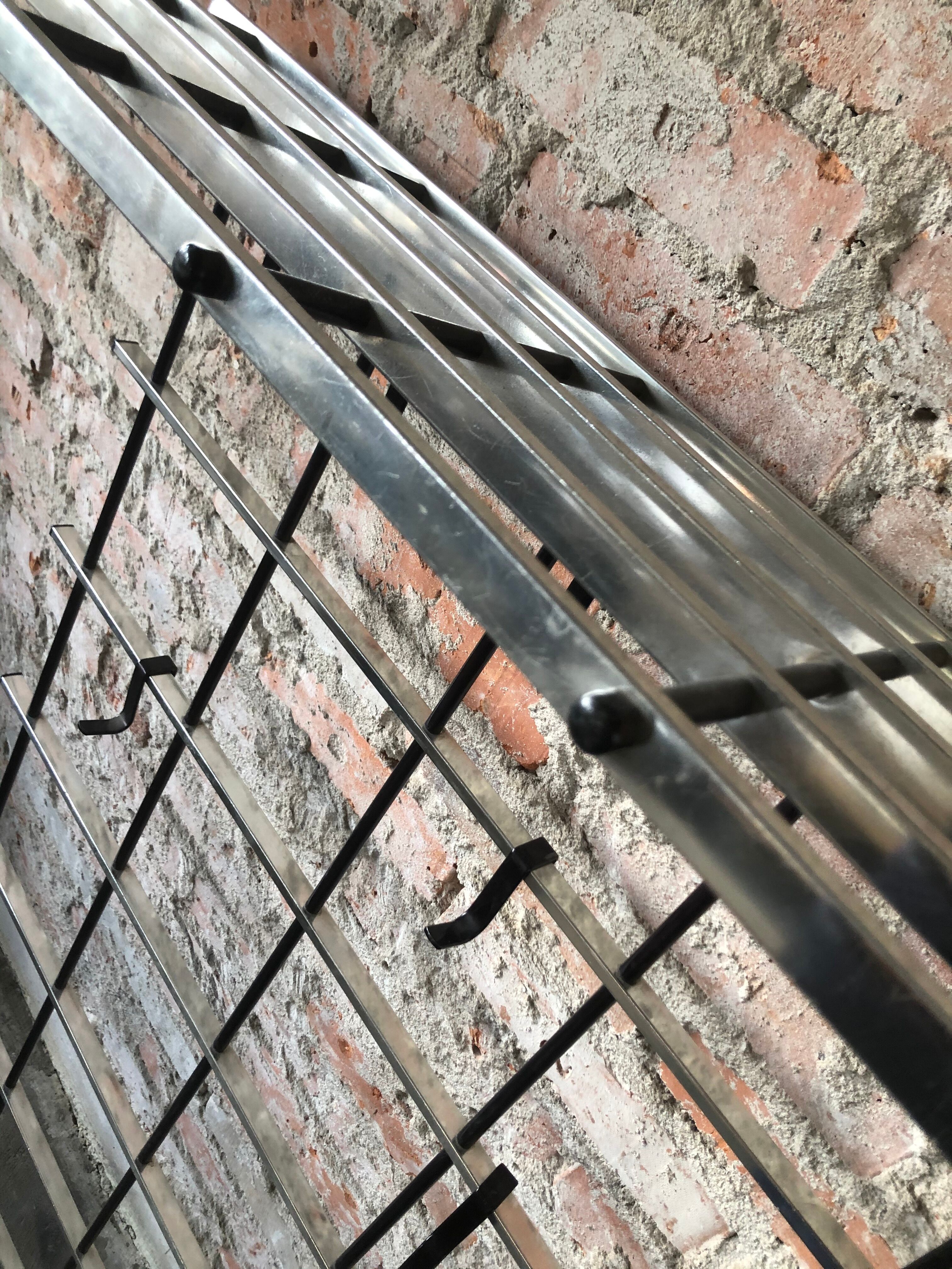 Silver & black metal wall rack, 1970