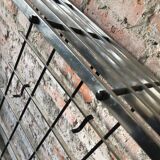 Silver & black metal wall rack, 1970