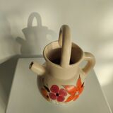 Pitcher ball in sandstone with floral pattern