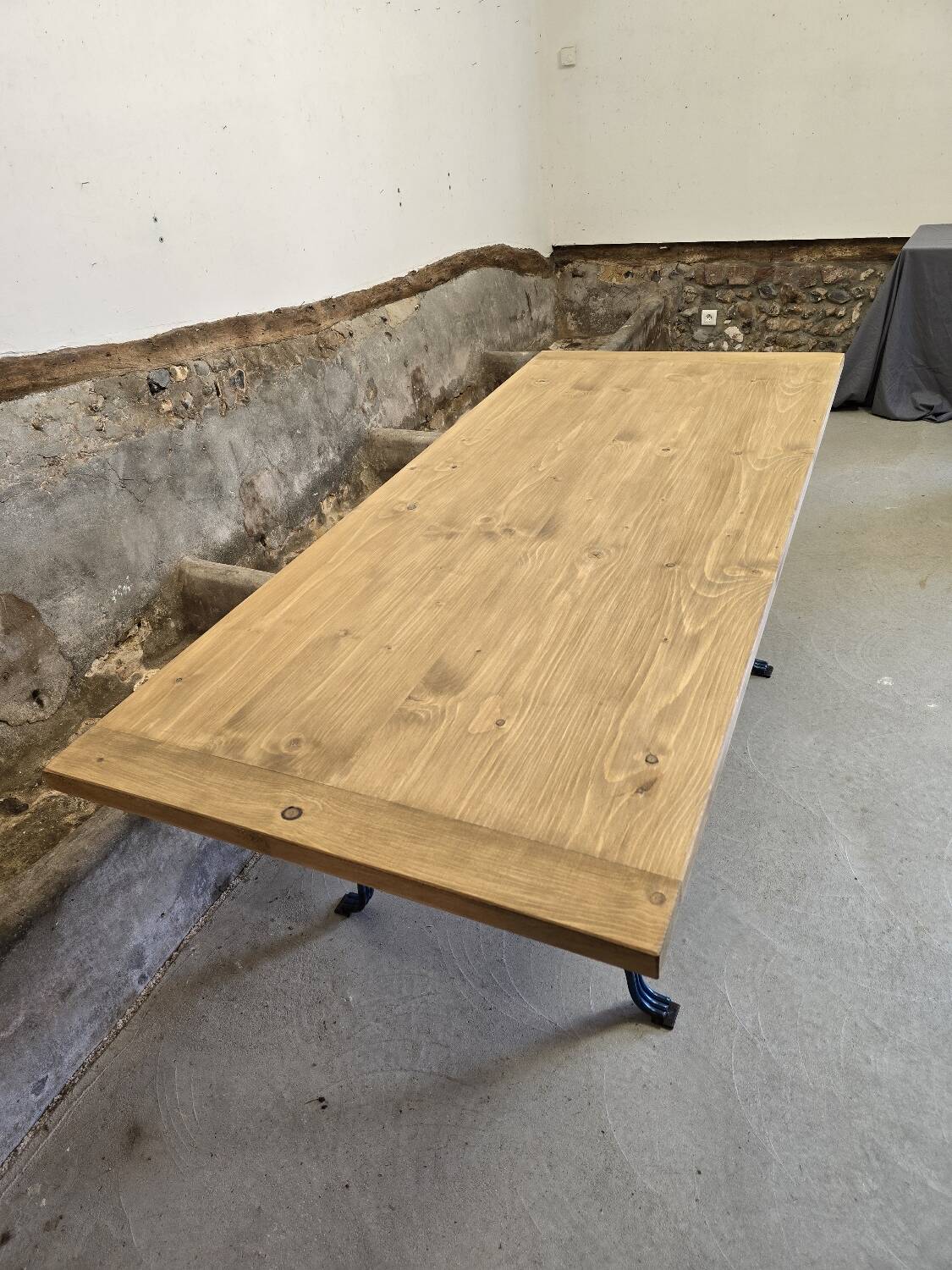 Wrought iron and solid wood table