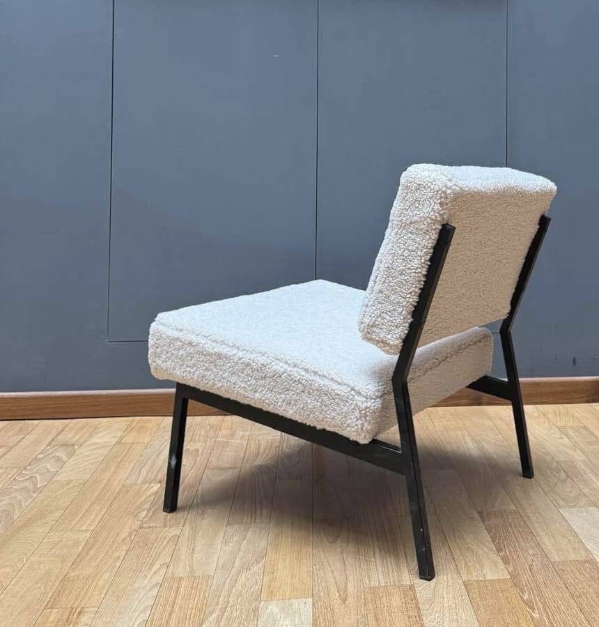 Pair of vintage armchairs, black metal and sheepskin fabric, France 1950.