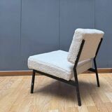 Pair of vintage armchairs, black metal and sheepskin fabric, France 1950.