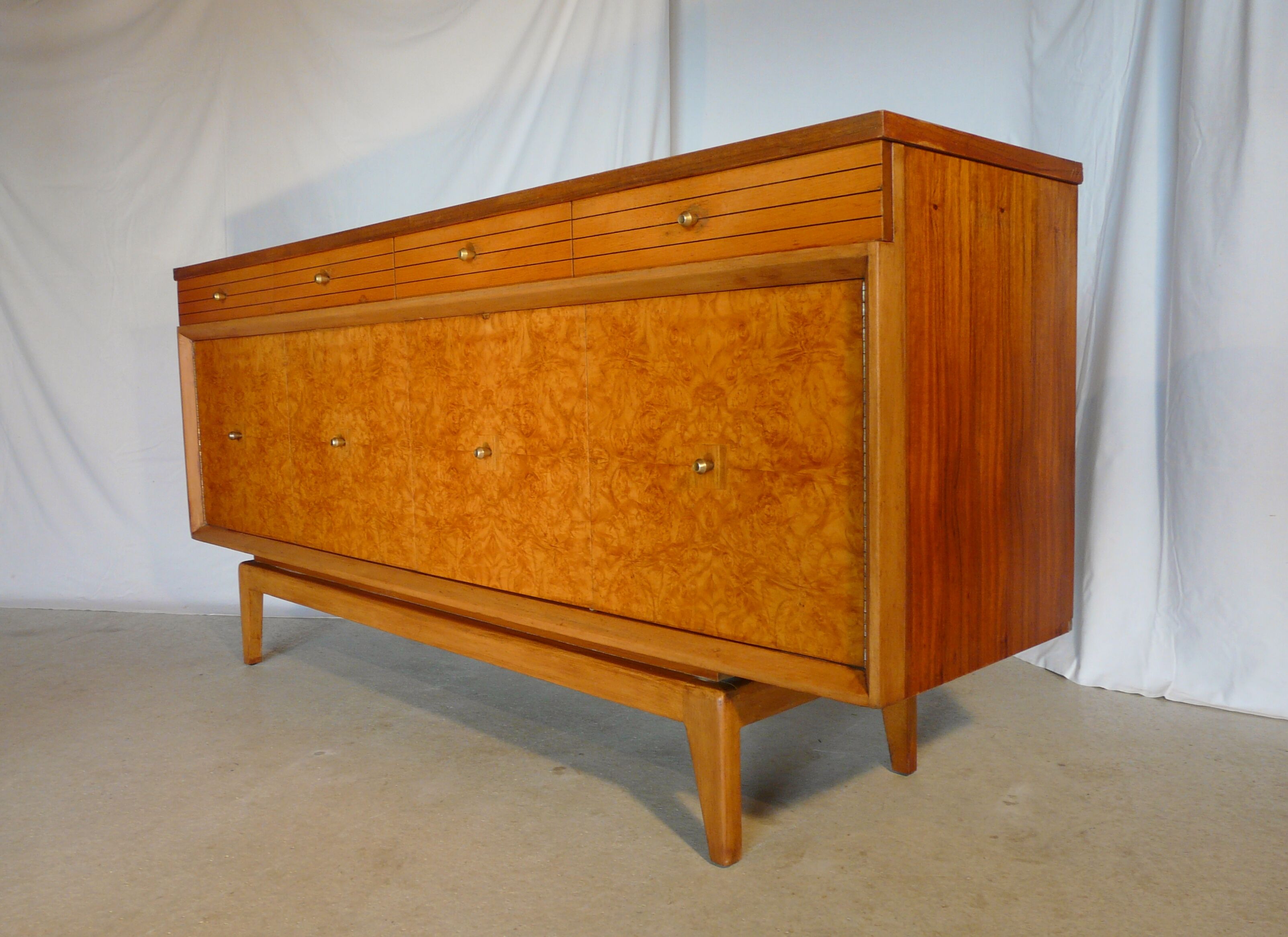 Scandinavian sideboard of blond wood and teak