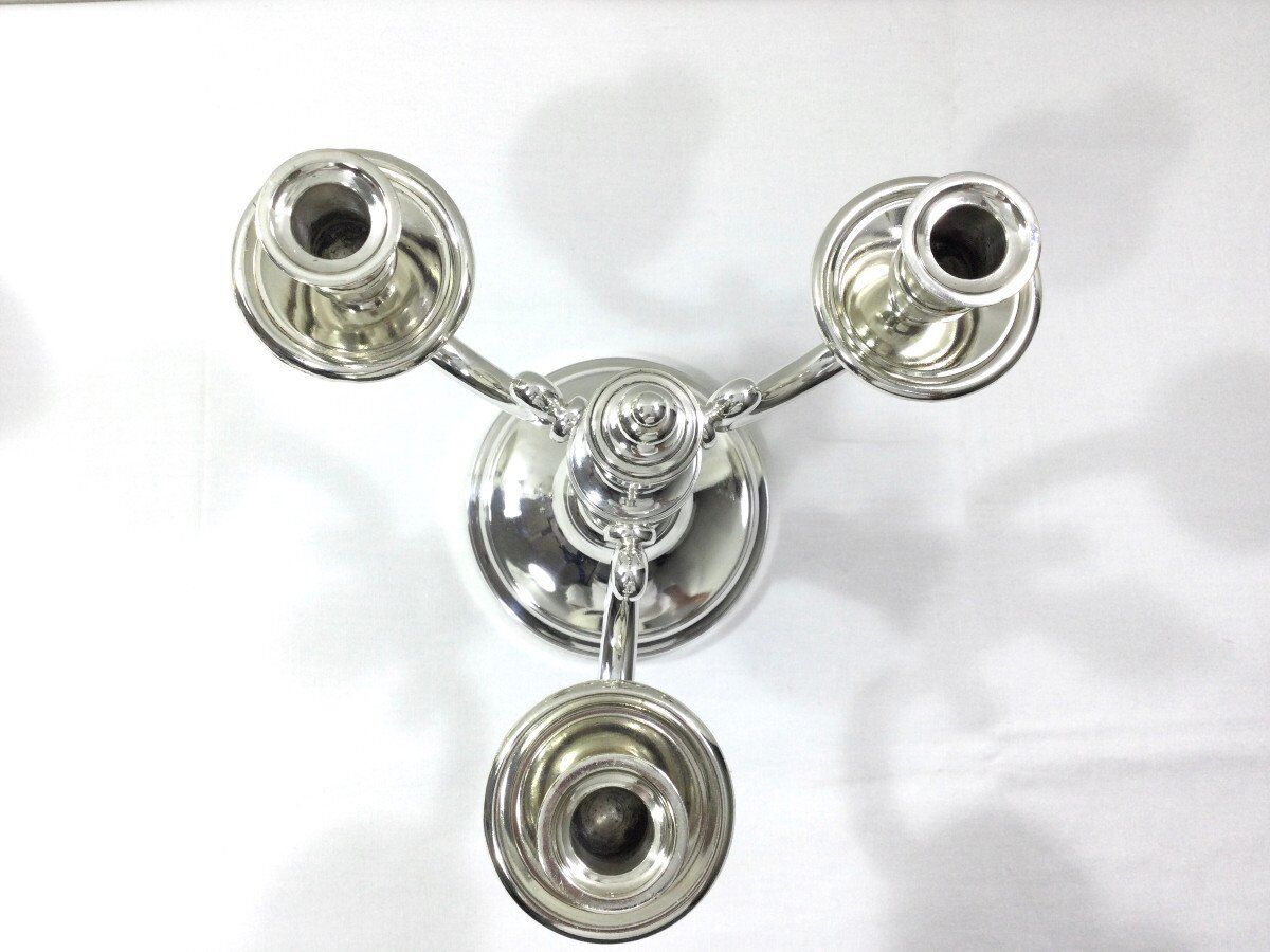 Pair of silver bronze candelabras