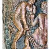 Antique red copper umbrella stand decorated with putti angels.