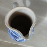 2 antique stoneware pitchers