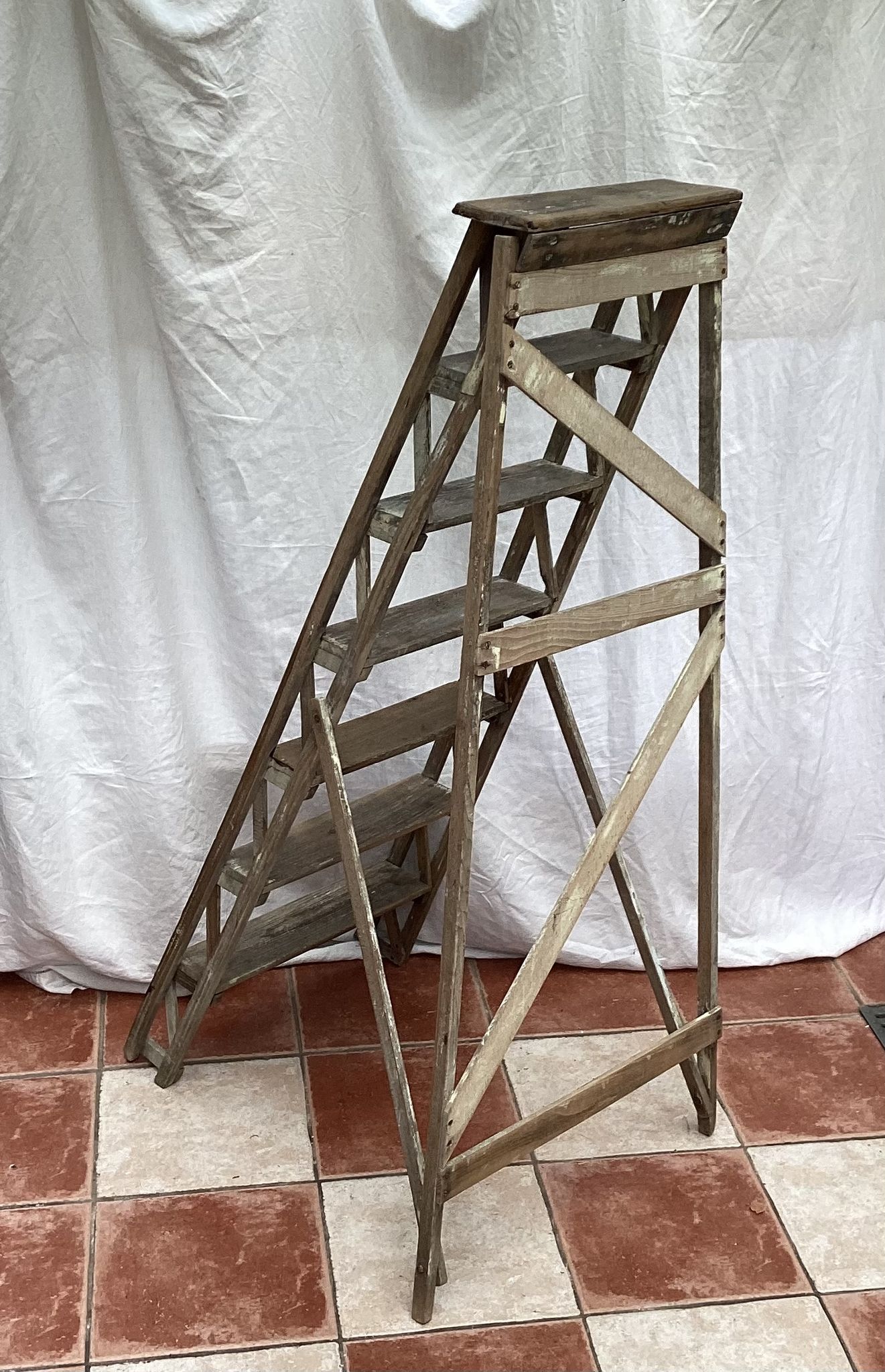 Wooden painter's stepladder in the middle of XX century foldable