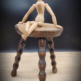 Tripod wood stool with foot balls