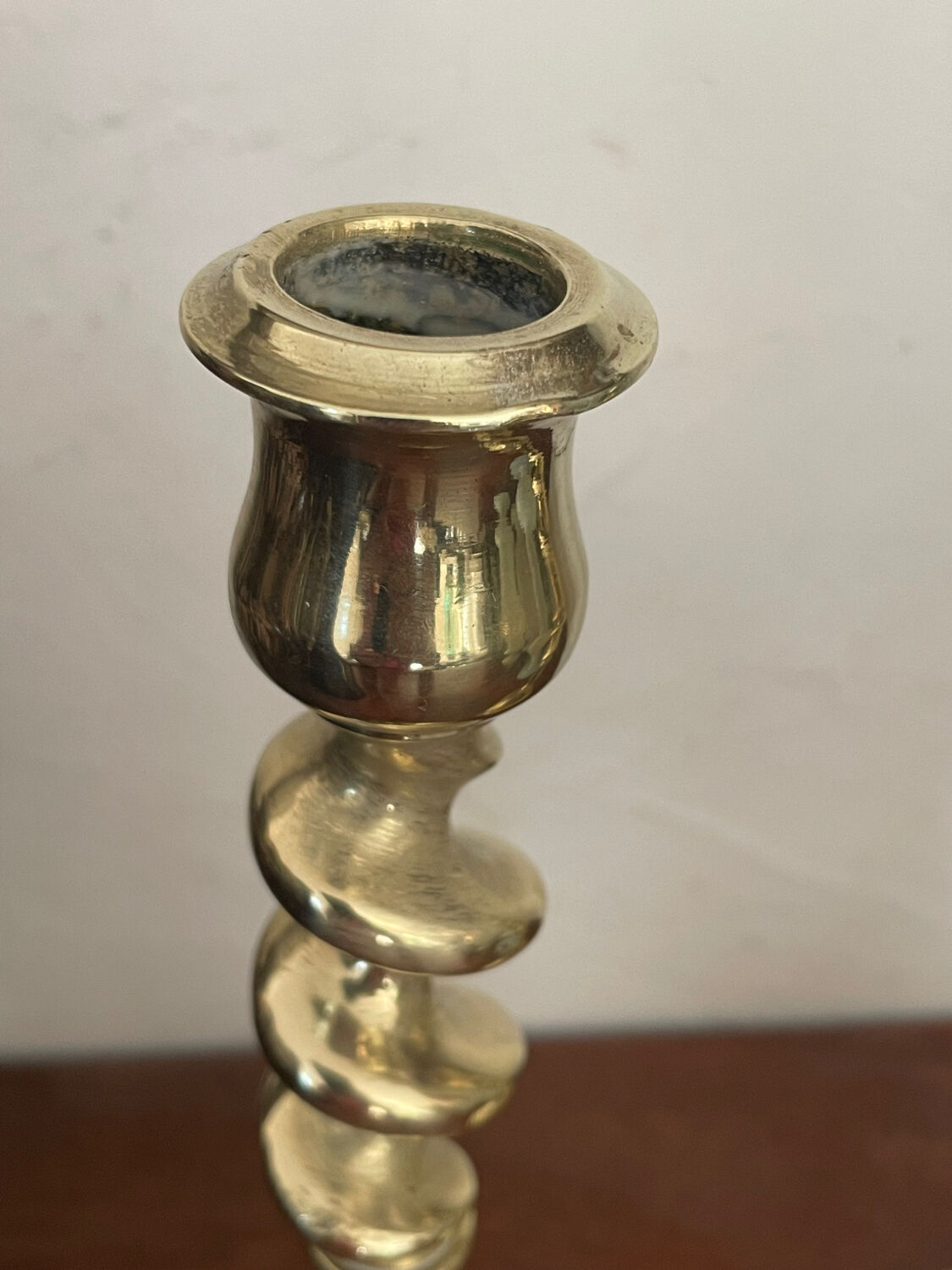Pair of twisted solid brass candle holders