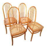 Set of 4 vintage Baumann chairs in honey wood and cane.