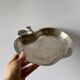 Silver metal apple pocket emptier