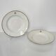 Service d’assiettes à bord doré, monogrammées | E. Bourgeois | Fin XIX
