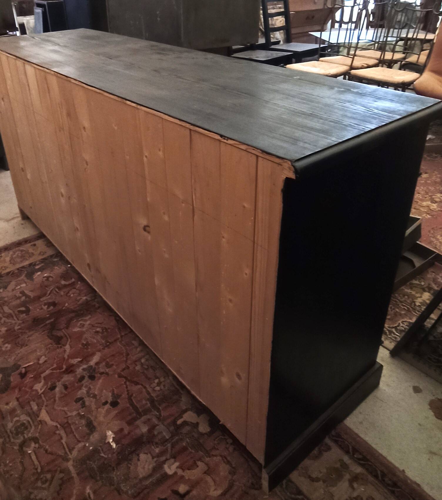 Black patinated chest of drawers