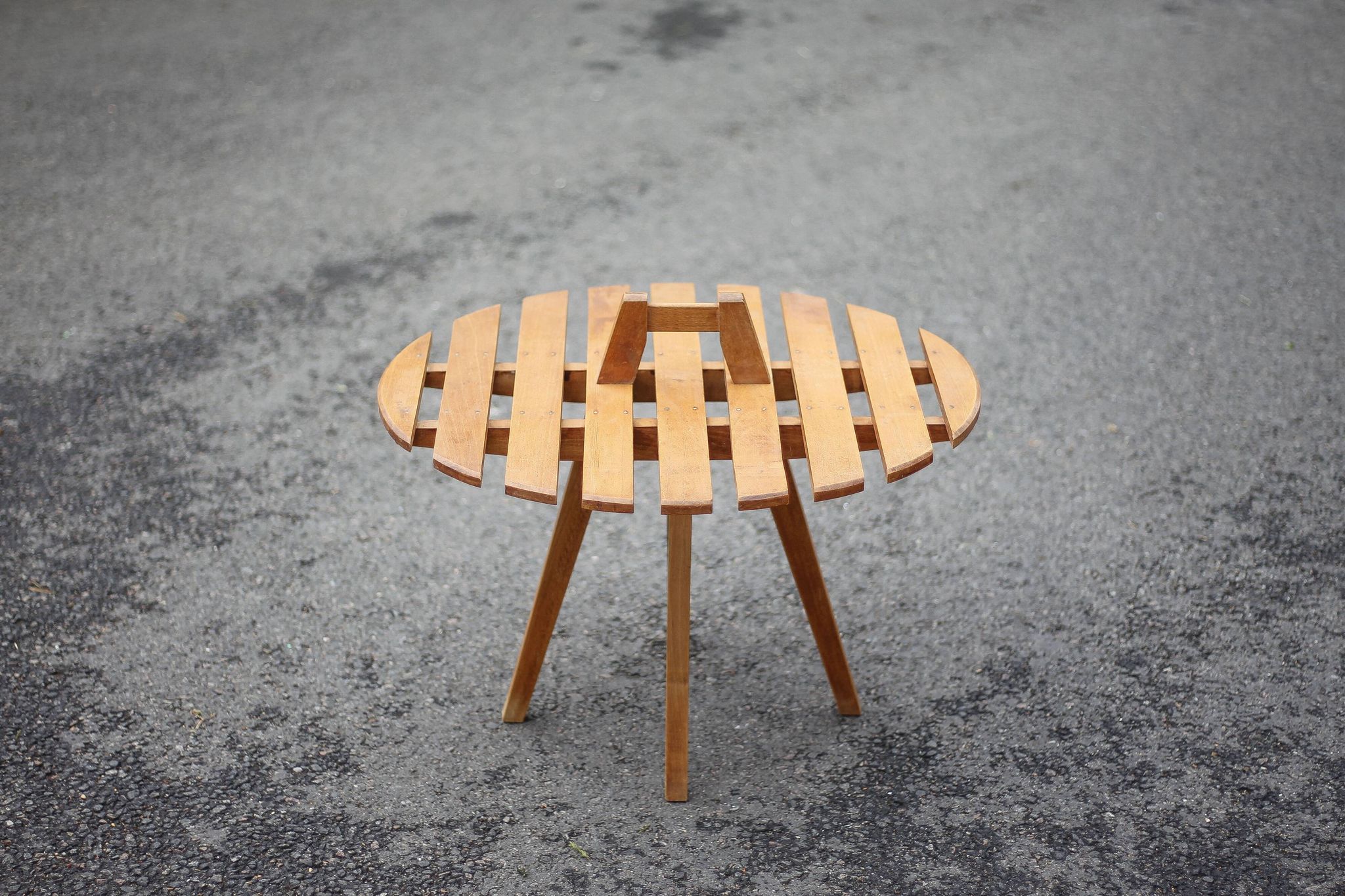 Vintage coffee table, wooden table with central handle, interior decoration, terrace, patio