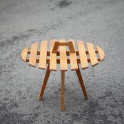Vintage coffee table, wooden table with central handle, interior decoration, terrace, patio