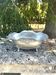 Footed pewter champagne cooler on claw feet with floral relief