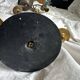 Pair of Empire style candlesticks, patinated brass and black stone.