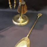 Brass fireplace set with 4 accessories.