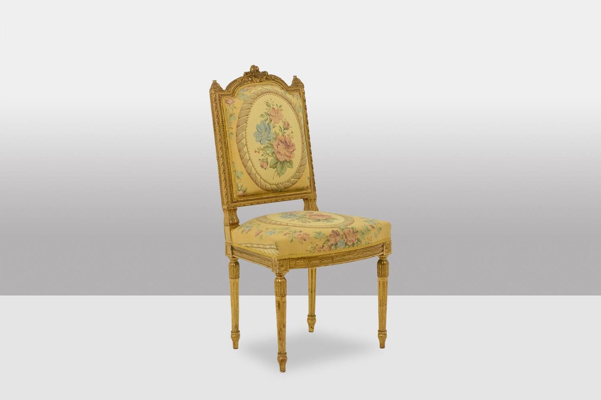 Pair of gilded wooden chairs with upholstery. Louis XVI period.