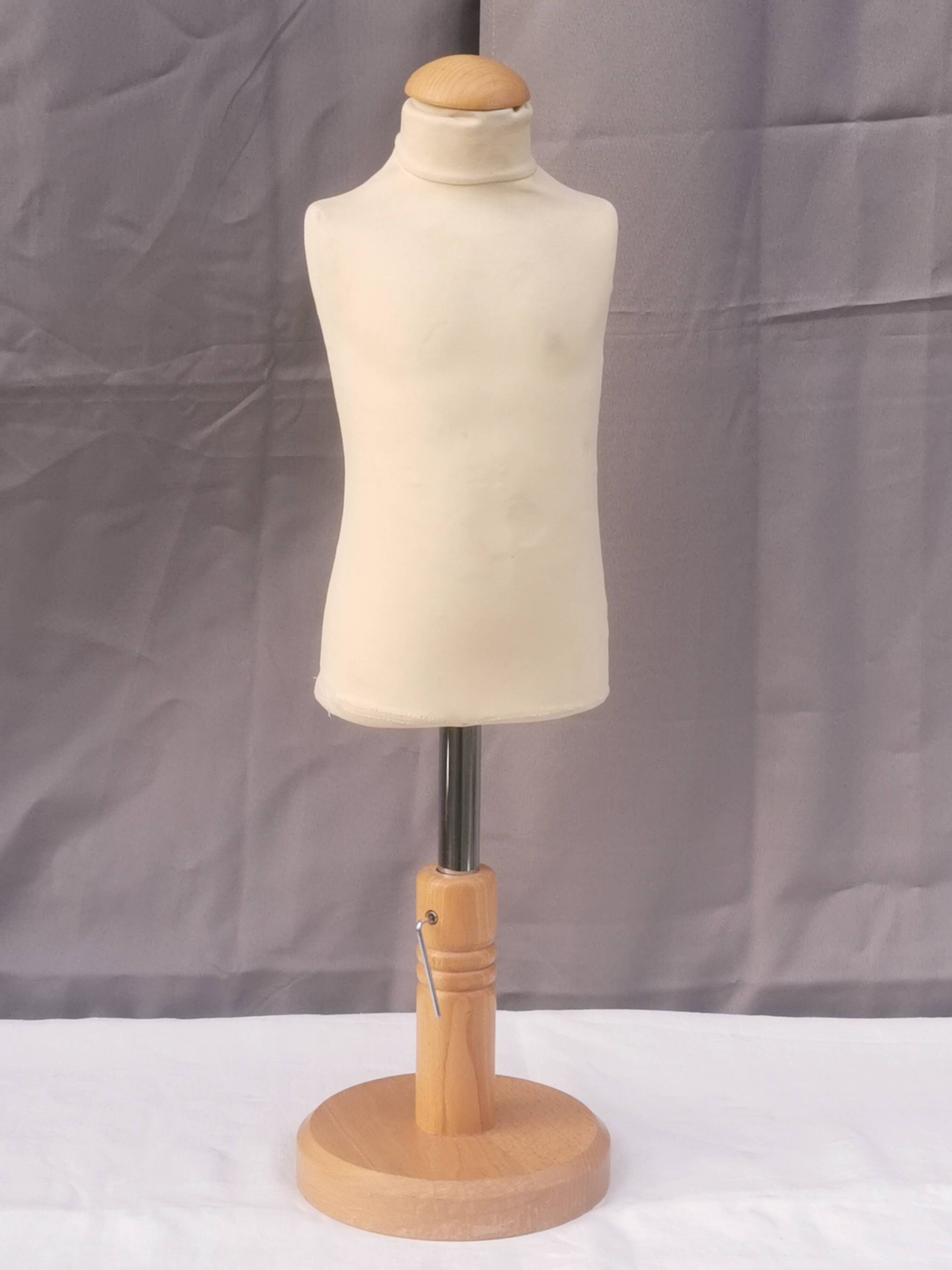 "Child bust" mannequin on base