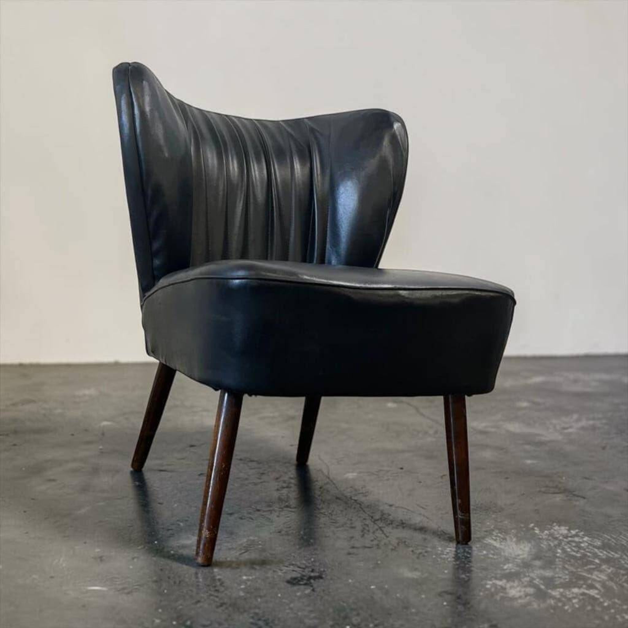 Fauteuil cocktail vintage en similicuir noir / siège unique
