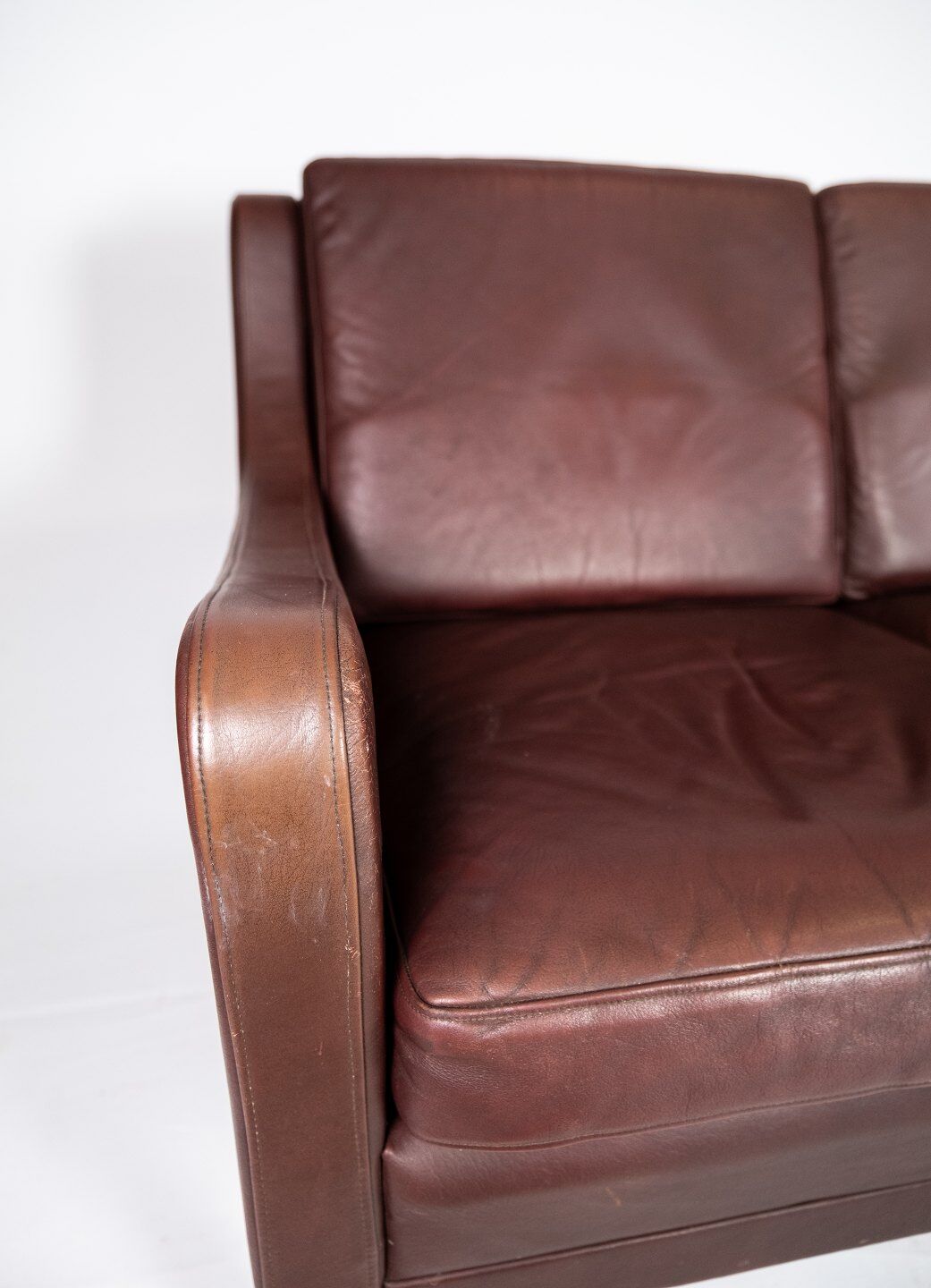 Three seater sofa, with red brown leather by Stouby Furniture from the 1960s