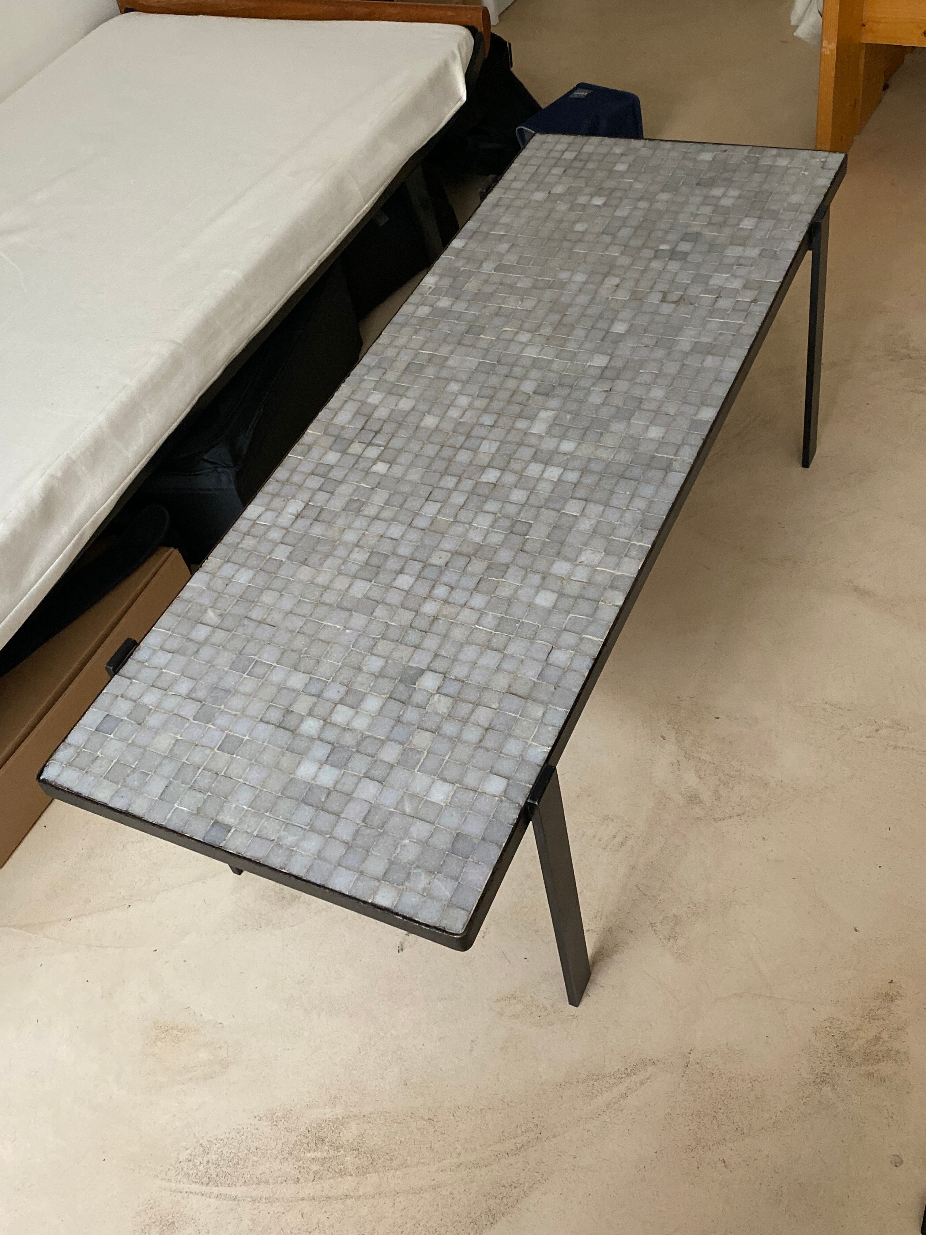 Black steel coffee table and small glass paste tiles