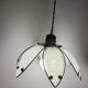 Glass flower rimmed with brass