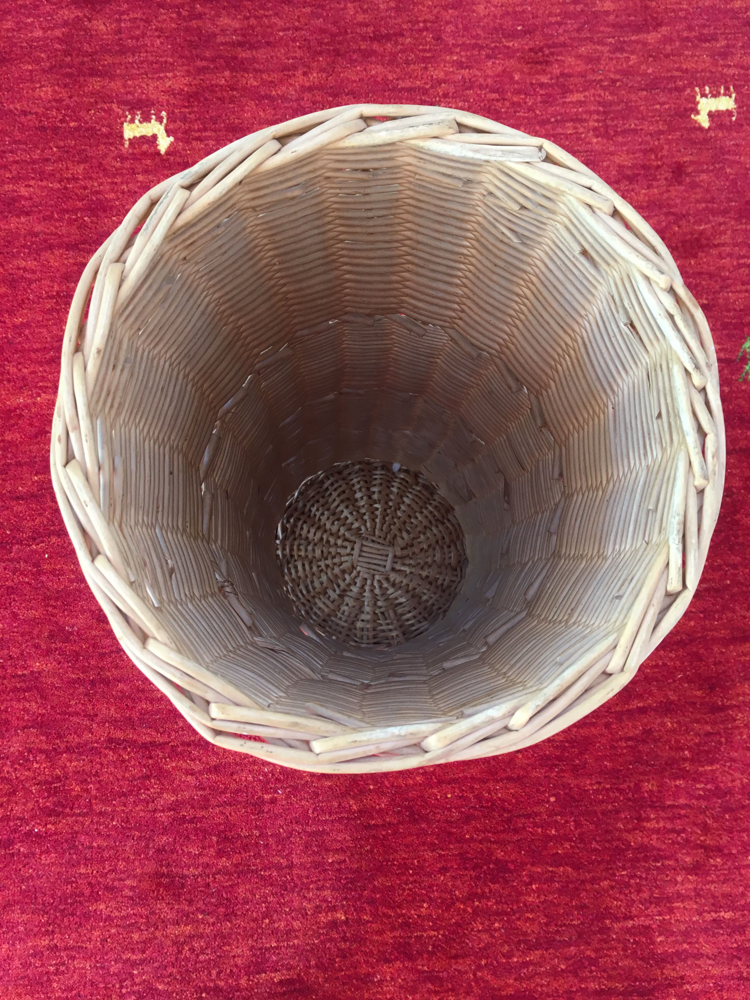 Vintage umbrella holder in wicker rattan