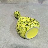 Yellow ceramic vase with green highlights