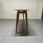 Console from the 1950s with a pink marble top and a cherry wood frame.