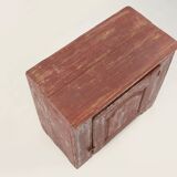Rustic Parisian cabinet in pine wood with old burgundy paint layers, ca. 18