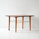 Vintage Scandinavian coffee table in teak with brass shelf