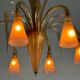 Venetian chandelier in beige/gray murano glass bordered with a red net