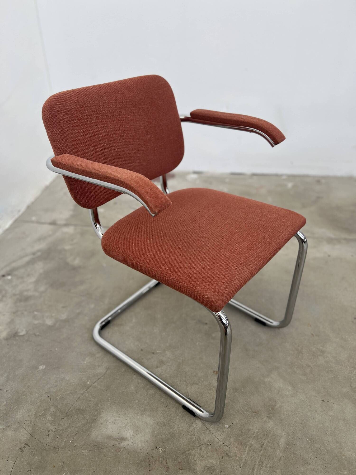 Pair of Marcel Breuer B64 Knoll armchairs in coral fabric