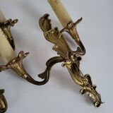 Ancienne paire d'appliques en métal doré style Louis XV - 2 lumières