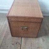 Wooden trunk with braiding
