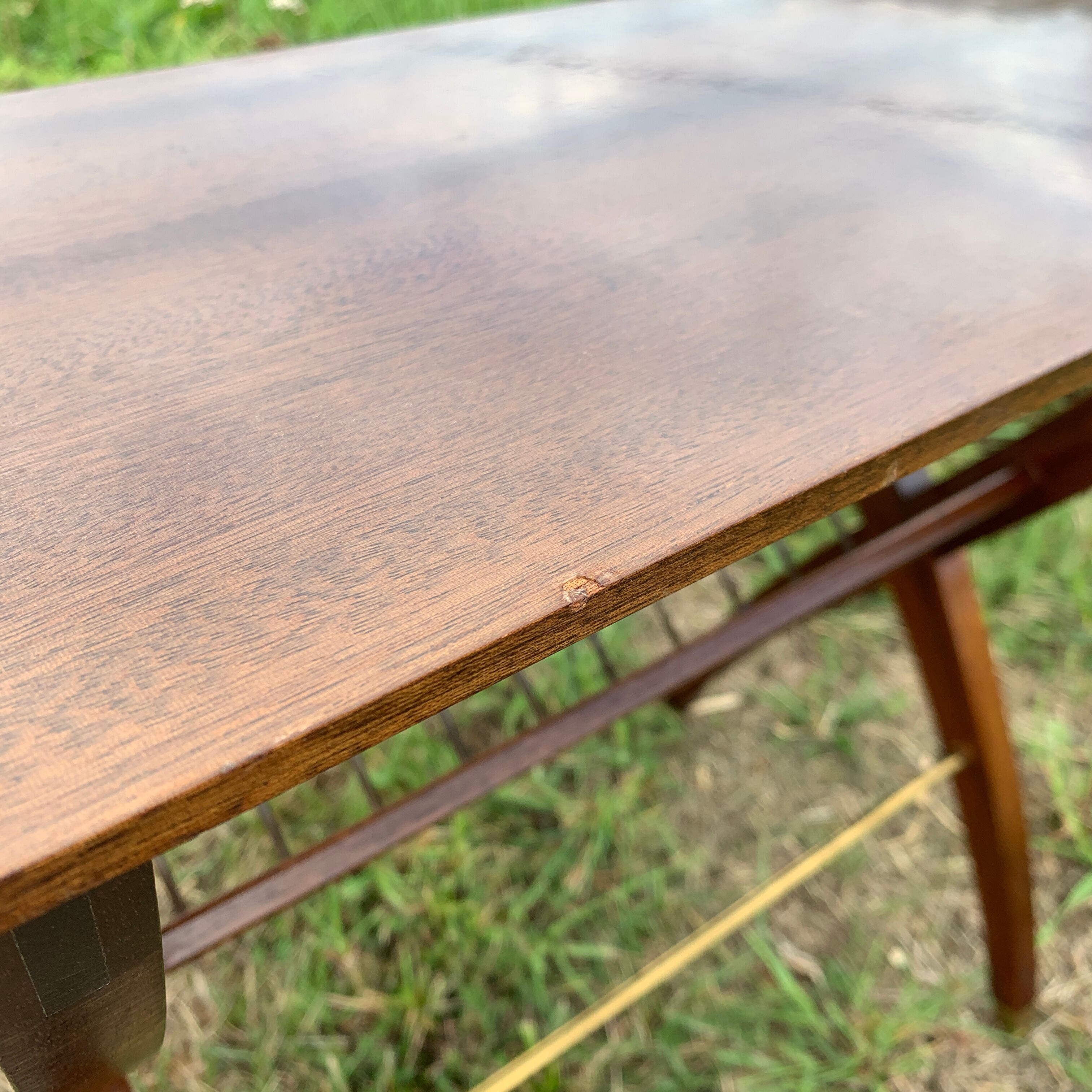 Magazine rack with wooden and gilded brass tablet