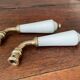 pair of Limoges porcelain handle levers UCDA and l
