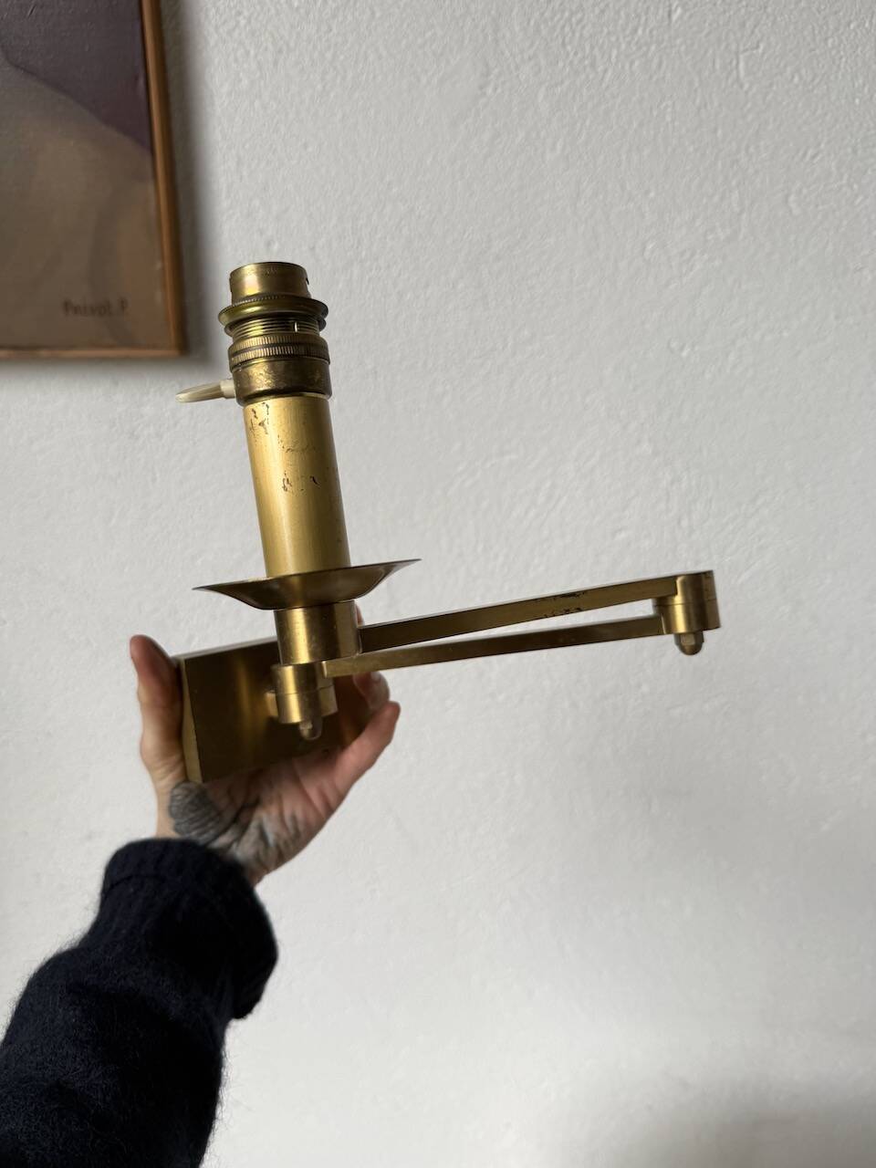 Pair of brass wall lights with articulated arms from the 70s