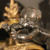 Paire de chenets aux anges en bronze