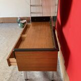 Scandinavian teak dressing table with a large round mirror.