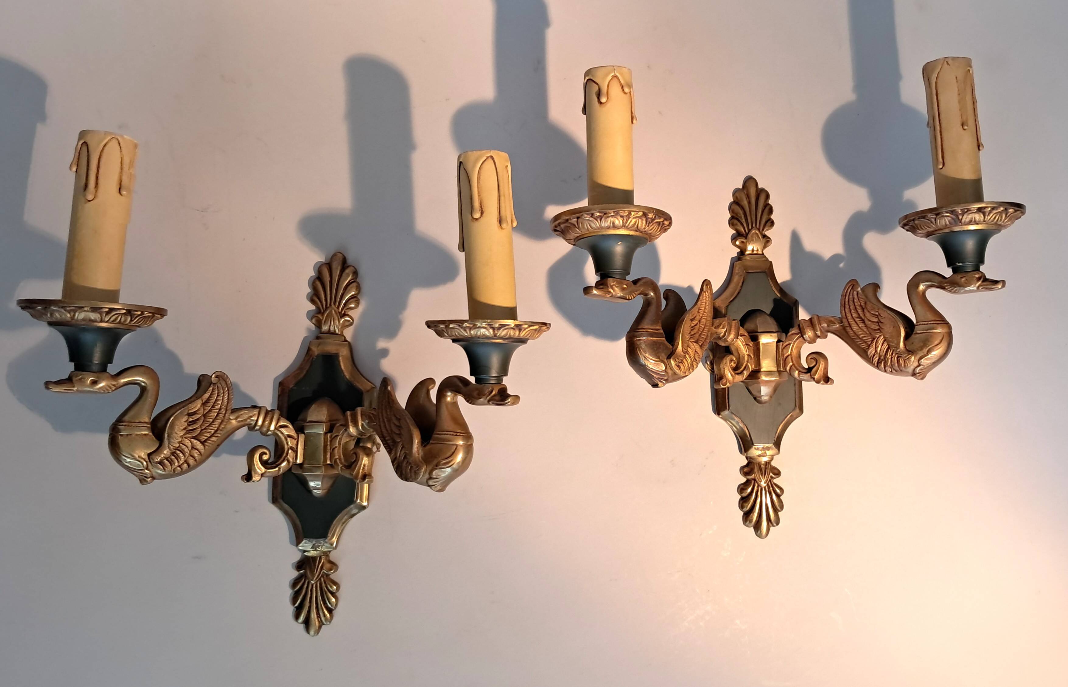 Pair of gilded bronze and green lacquer wall sconces by Maison Lucien Gau, Paris.
