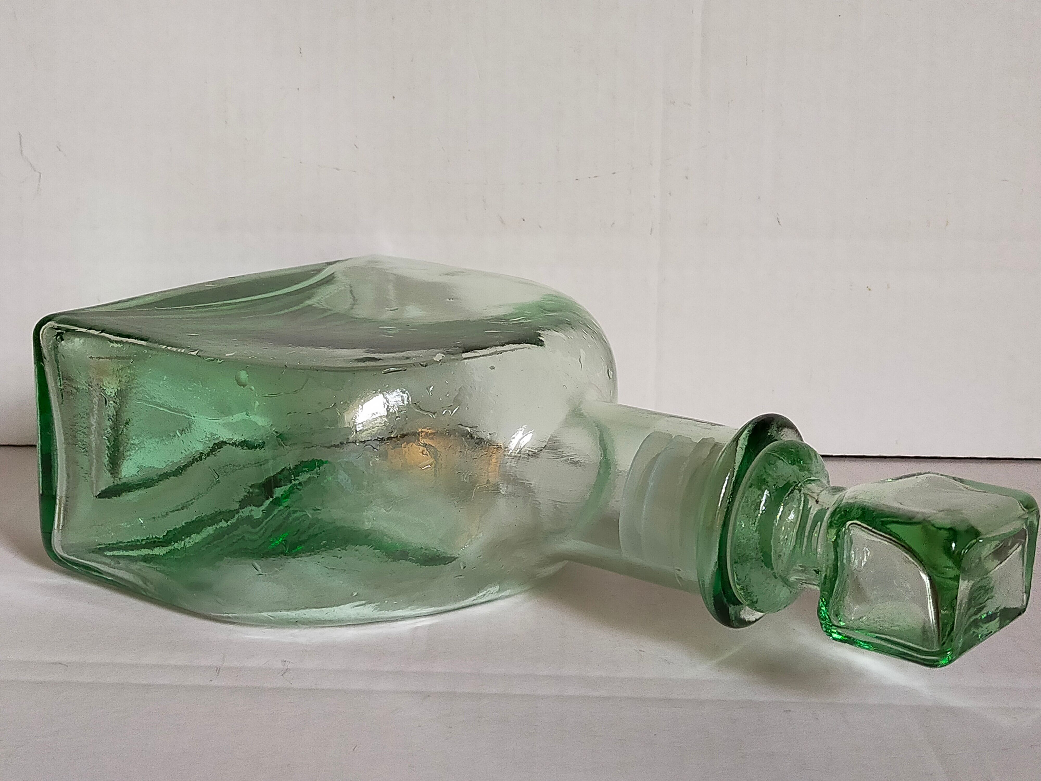 Vintage green glass whiskey decanter